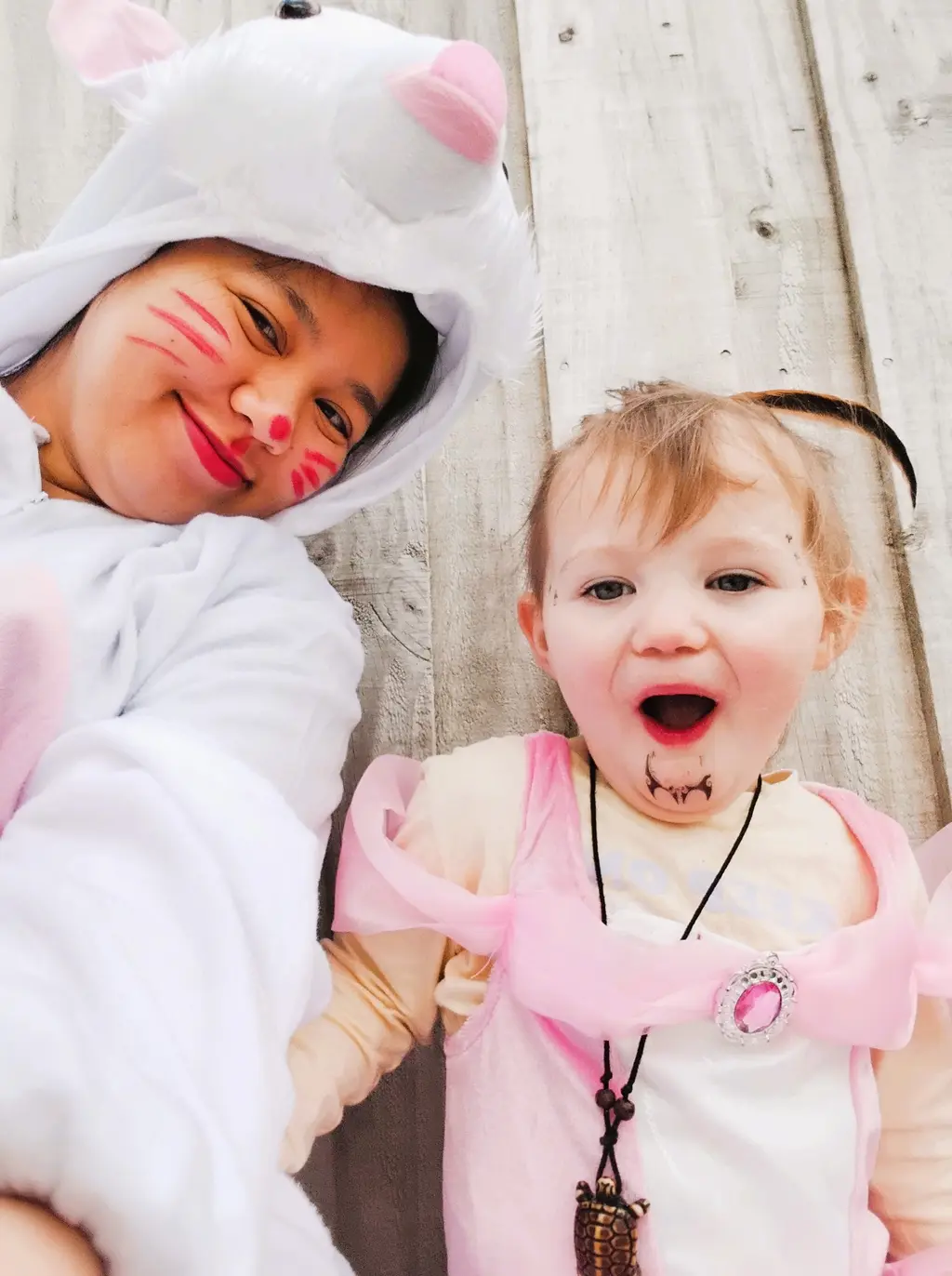 Two children enjoying dress-up play together